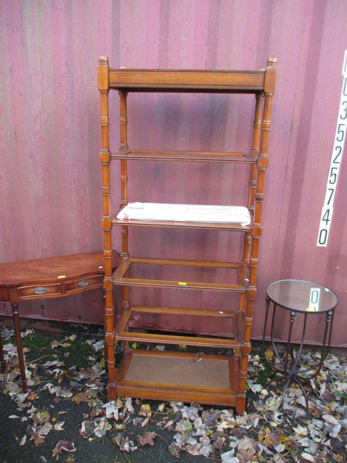 Furniture to include an American walnut six tier shelf, a two drawer hall table and a wrought metal,