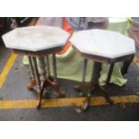 A pair of marble topped walnut octagonal occasional tables 77cm high x 55cm wide