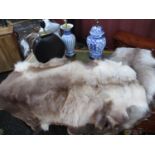 Two reindeer hides and three table lamps, comprising of two blue and white porcelain examples
