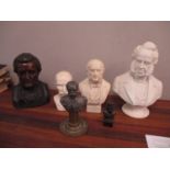 Two Victorian Parian busts, a white glazed bust and three cast metal examples, each of distinguished