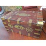 A 19th century Indian teak travelling/Mandalay box having brass mounts, twin handles and fitted