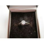 An 18ct yellow gold and platinum diamond solitaire ring, total weight 2g