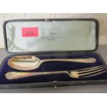 A 1924 Walker and Hall silver spoon and fork set, boxed, 94g