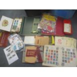 Postage stamps from around the world in various albums and loose, along with an 1846 envelope with