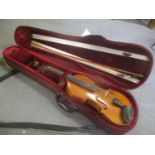 A reconditioned mid 20th century violin and bow, cased
