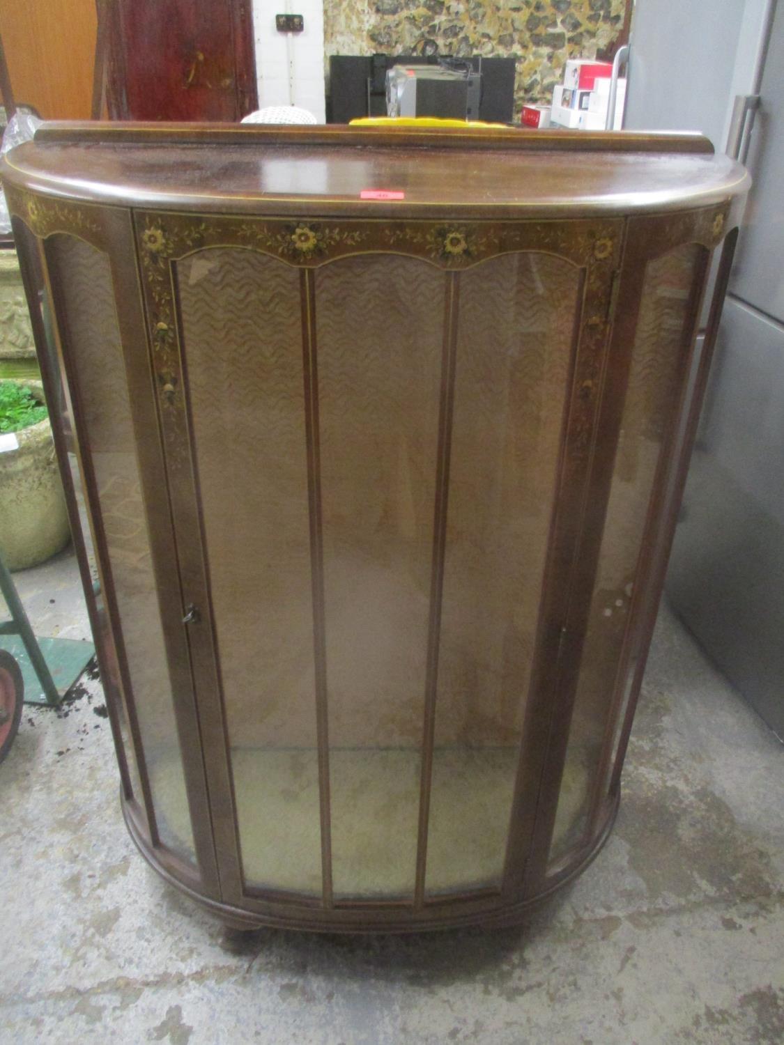 A mid 20th century walnut display cabinet on short cabriole feet