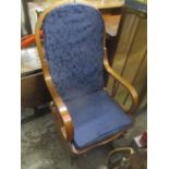 American style beech rocking chair with padded seat and back cover in blue