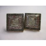 A pair of silver gilt earrings of square form set with diamonds