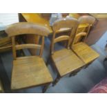 A set of six 19th century oak country bar back dining chairs