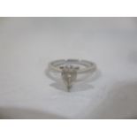 An 18ct white gold ring set with a pear shaped brilliant cut diamond, 0.46ct, colour 1, clarity S/I,