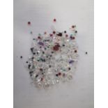 Parcel of loose mixed stones including cubic zirconia, amethyst, ruby emerald, sapphire and