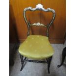 A Victorian ebonized and mother of pearl inset bedroom chair, overstuffed seat, splayed front legs