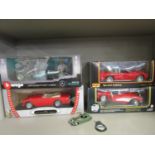 A group of model diecast collectors cars to include a Burago Mercedes F1 WD7 Hybrid, a Road