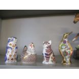 Three Crown Derby models of animals with gold coloured stoppers, together with a Oro de Ley model of