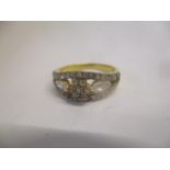 A silver gilt ring set with diamonds