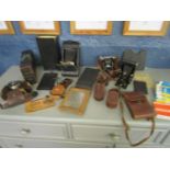 A mixed lot of vintage cameras, light meters and accessories to include an Ihagee Exakta leather