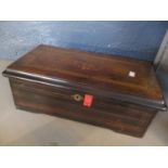 A late 19th century walnut and marquetry musical box playing eight airs