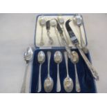 A selection of silver spoons in various forms, together with three silver handled knives, total
