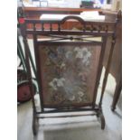 An early 20th century mahogany framed fire screen with inset tapestry Location:RWM