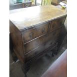 A 19th century Queen Anne style chest on stand, two short and two long drawers standing on