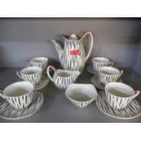 A Midwinter Stylecraft coffee set, complete, six setting (Please note the photograph depicts a