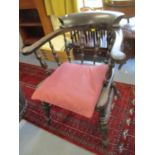 Circa 1900 an oak bow back desk chair Location: C