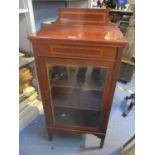 An Edwardian inlaid mahogany display cabinet, 106h x 505cm w