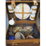 A modern Robert Dyas picnic hamper and contents