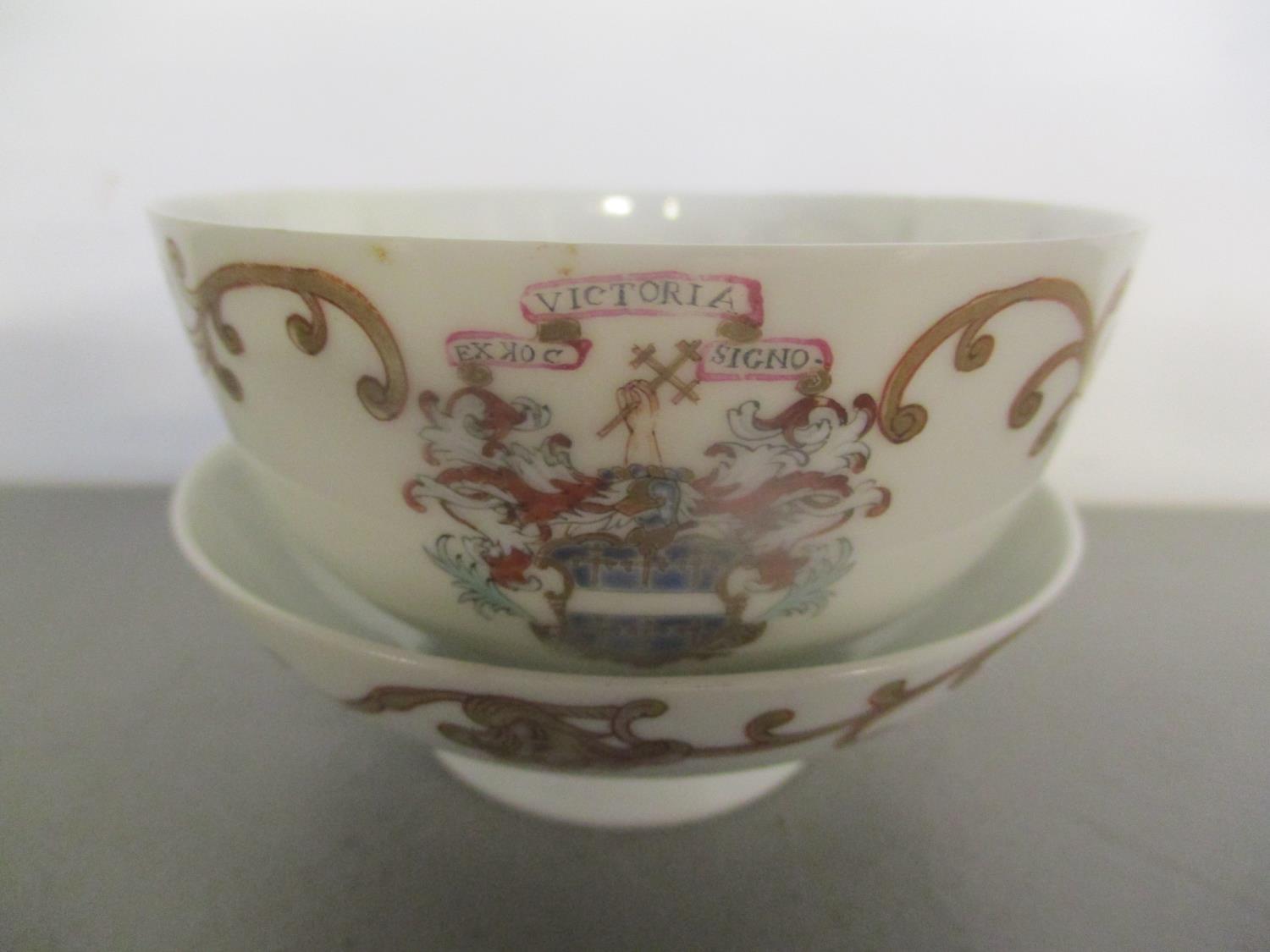 An early 19th century Chinese Armorial tea bowl and saucer