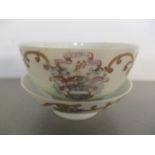 An early 19th century Chinese Armorial tea bowl and saucer