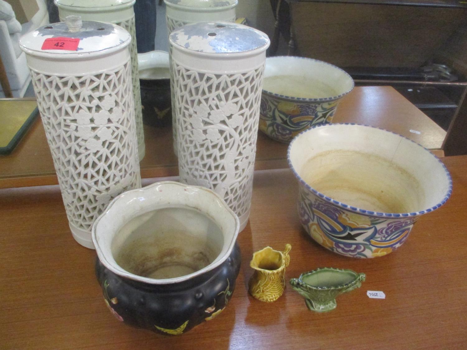 A mixed lot to include a pair of Chinese pierced vases, Poole pottery bowl and other items