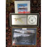 Concorde and aviation memorabilia to include a picture wall clock, a framed photograph of Concorde