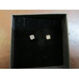 A pair of 18ct white gold four claw-set RBC diamond solitaire studs, boxed, Diamonds 0.40ct
