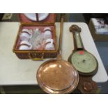 An early 20th century mahogany cased aneroid barometer together with a Victorian copper warming