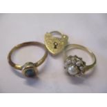 A quantity of 9ct gold jewellery to include two rings and a heart shaped clasp 6.2g