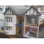 A part finished scratch built dolls house, 65cm high x 85cm wide. Location:RWM