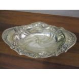 An Art Nouveau silver dish with embossed ornament 23cm w 130g