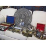 A large Persian tray, mixed silver plate and metalware to include boxed cutlery and flatware, a pair