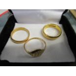 Three gold rings to include a 9ct gold signet ring engraved with letter W, 1.4g and two 22ct