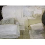 A collection of Victorian and later British and Continental linen and lace to include tablecloths,