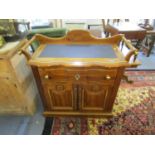 A Continental wood side unit/washstand with shaped extended back with incised fir cone decoration,