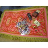 A Retro Casa Pupa style pink ground rug together with costume jewellery, an Oris watch, mother of