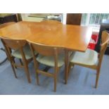 A mid 20th century retro Nathan extending dining table and five chairs