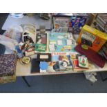 A quantity of vintage games to include a boxed Binatone colour TV game model 01/4931, various