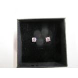 A pair of 18ct white gold four claw-set RBC diamond solitaire studs, boxed. Diamonds 1.01ct