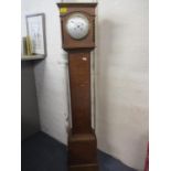 A 1930s tiger oak long case clock with eight day movement, 134cm h, an early 20th century oak stud