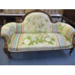 An early 20th century walnut salon sofa with later upholstery 164cm w x 60cm d