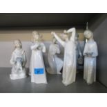 A group of Nao and Lladro porcelain figurines