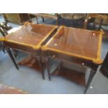 A pair of modern mahogany two tier side tables having inset drawers, two brush slides, fluted