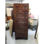 An adapted Victorian mahogany chest of seven drawers with a stained pine top, on bracket feet
